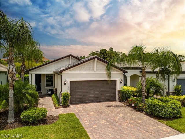 view of front of property with a garage