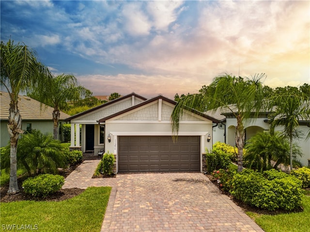 view of front of property featuring a garage