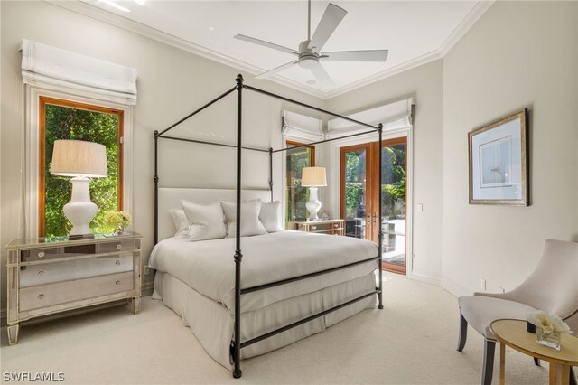 carpeted bedroom with crown molding, ceiling fan, french doors, and access to outside