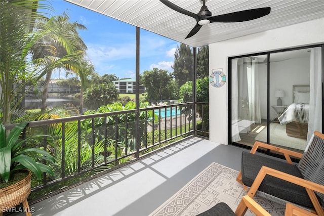 balcony featuring ceiling fan