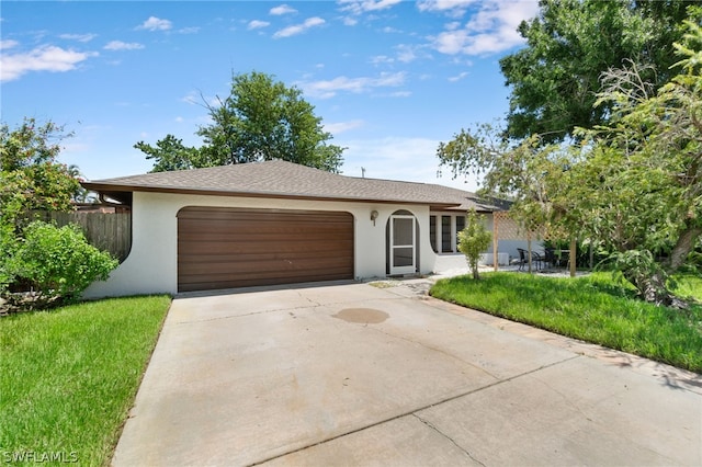 ranch-style house featuring a garage