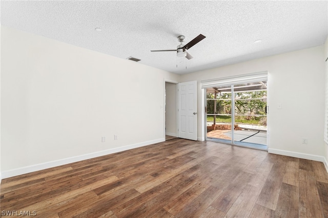 unfurnished room featuring wood-type flooring, a textured ceiling, and ceiling fan