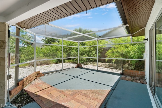 exterior space with a lanai and a patio area