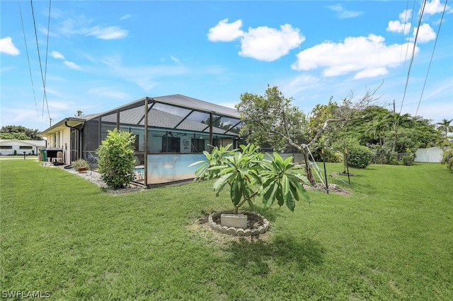 view of yard featuring a lanai