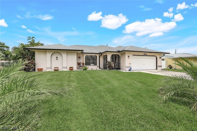 view of front of home featuring a front lawn and a garage