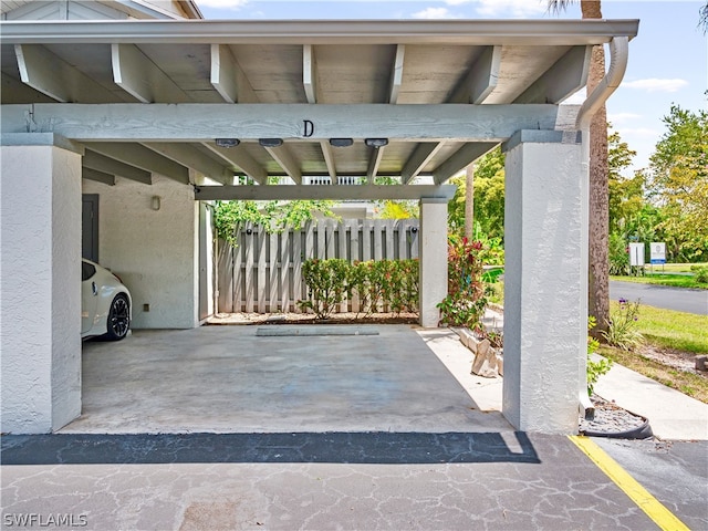 view of car parking with a carport