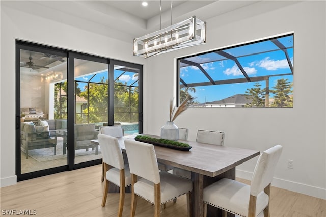 dining area featuring light wood-type flooring