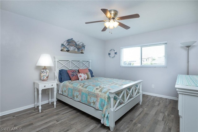 bedroom featuring dark hardwood / wood-style floors and ceiling fan