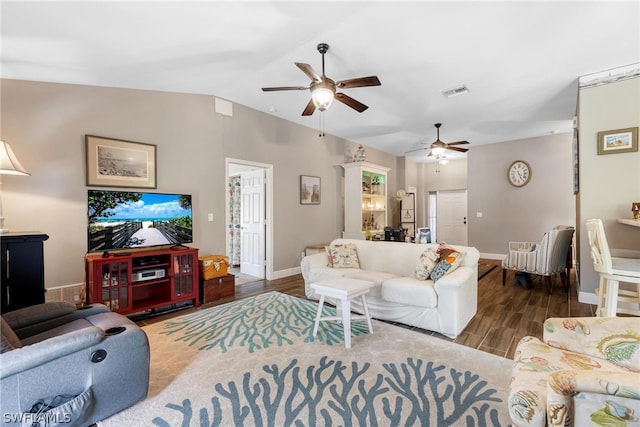 living room with lofted ceiling, ceiling fan, and wood-type flooring