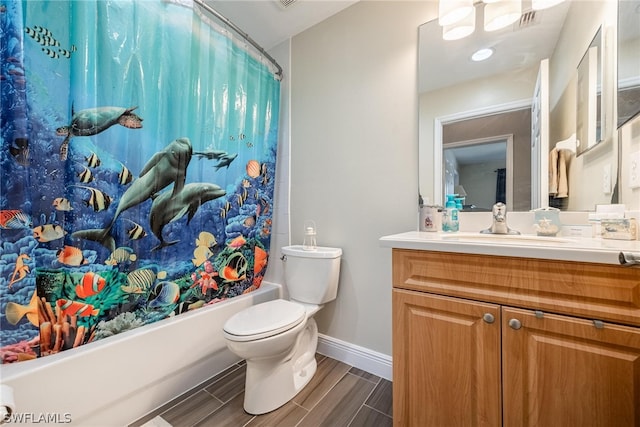 full bathroom with vanity, toilet, and shower / bath combination with curtain