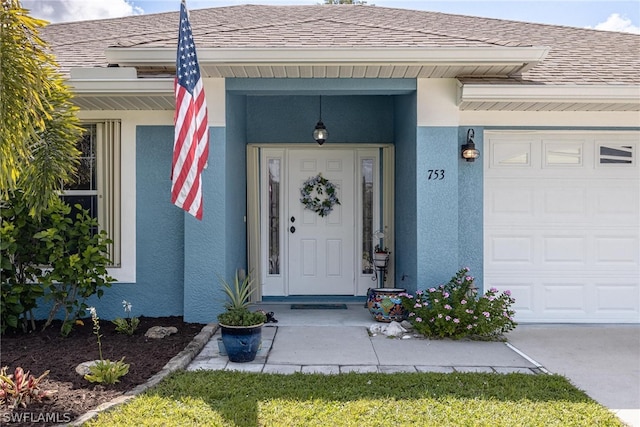 property entrance with a garage