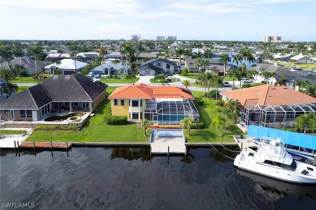 drone / aerial view with a water view