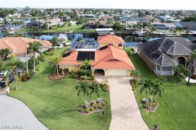 birds eye view of property featuring a water view