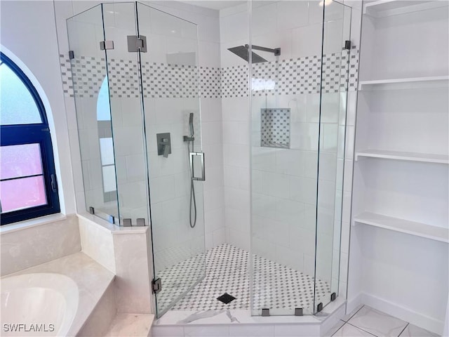 bathroom with independent shower and bath