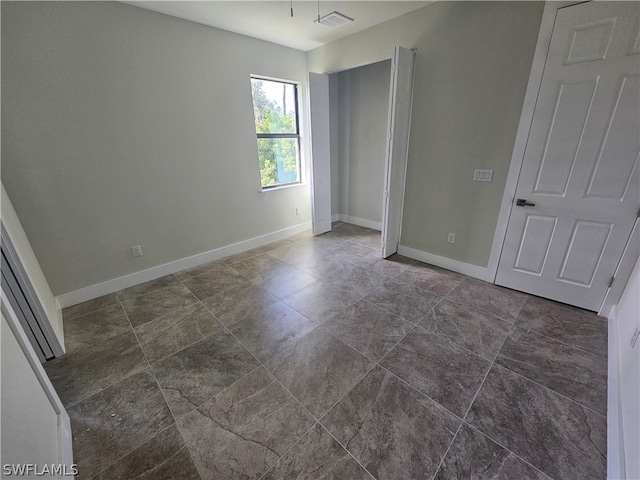 view of tiled empty room