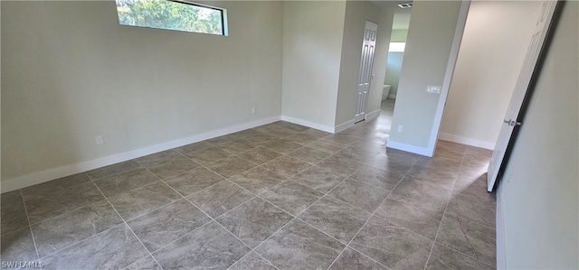 view of tiled spare room