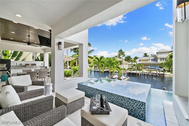 175 Conners Ave, Naples, FL 34108 - view of patio featuring an outdoor living space, ceiling fan, and a sink