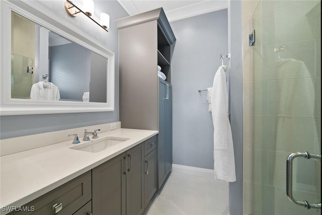 bathroom featuring vanity, an enclosed shower, and crown molding