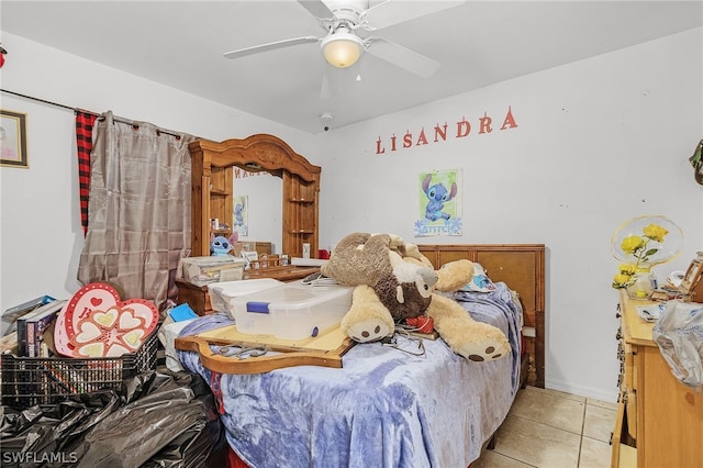 bedroom with light tile patterned flooring and ceiling fan