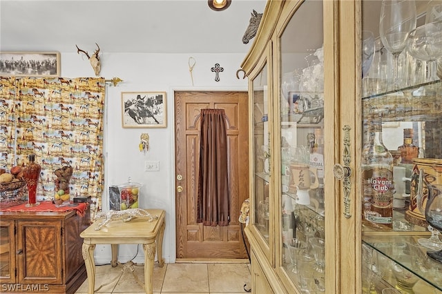 interior space featuring light tile patterned floors