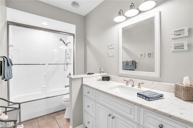 full bathroom with toilet, vanity, bathtub / shower combination, and tile patterned floors