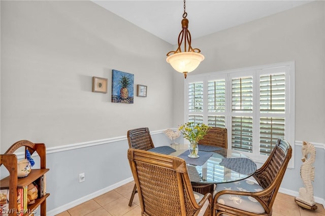 dining space with light tile patterned floors