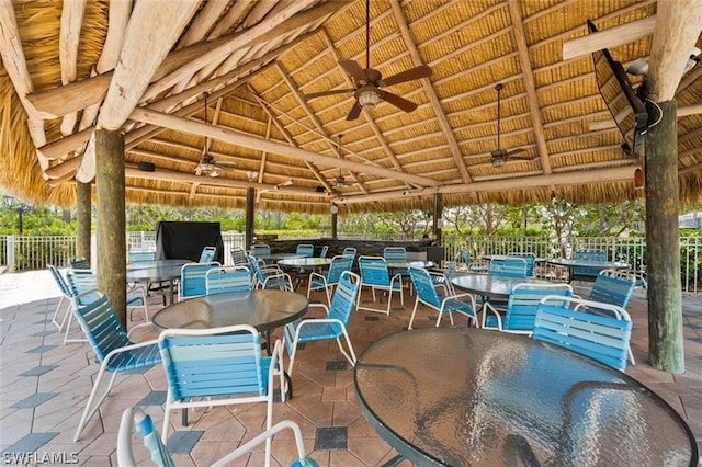 view of patio featuring ceiling fan and a gazebo