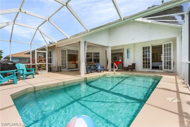 view of pool featuring a lanai and a patio area