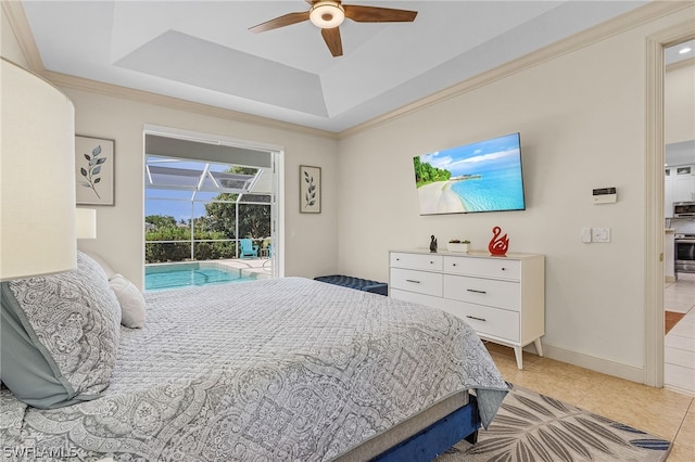 tiled bedroom featuring ceiling fan, access to exterior, crown molding, and a tray ceiling