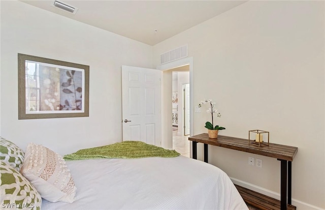 bedroom featuring hardwood / wood-style flooring