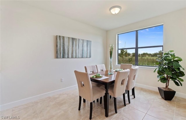 view of tiled dining space