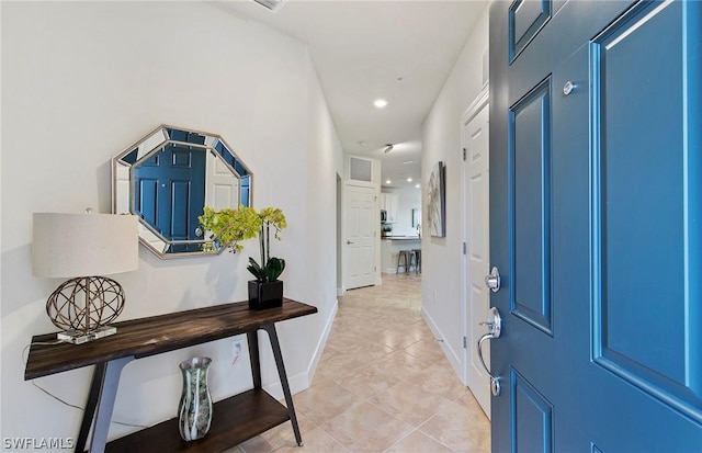 foyer with light tile patterned floors