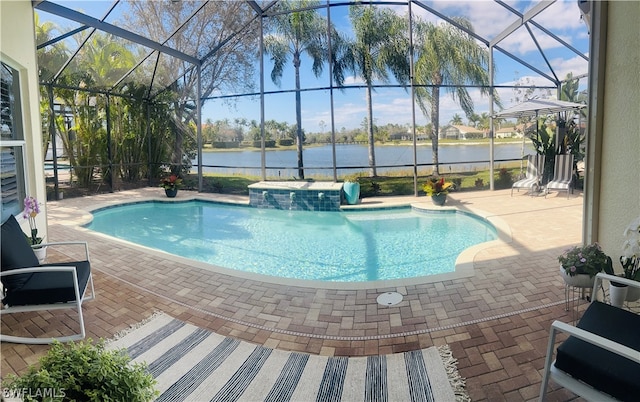 view of swimming pool with a lanai, a water view, and a patio area