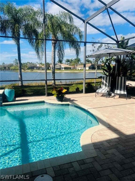 view of pool featuring a patio and a lanai