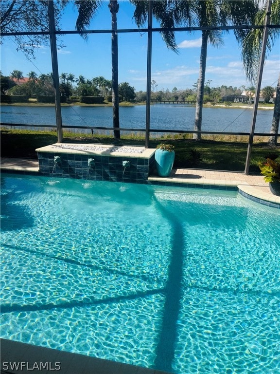 view of swimming pool featuring pool water feature