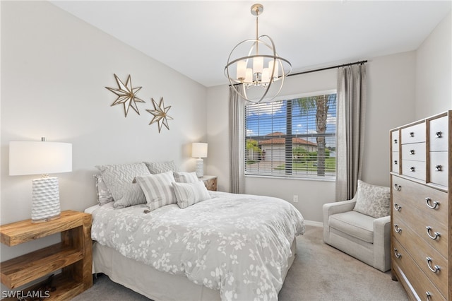 bedroom featuring light carpet and a notable chandelier