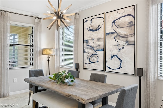 dining space with a notable chandelier and crown molding