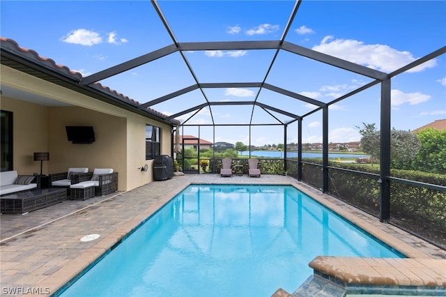 view of pool featuring a lanai, an outdoor hangout area, and a patio