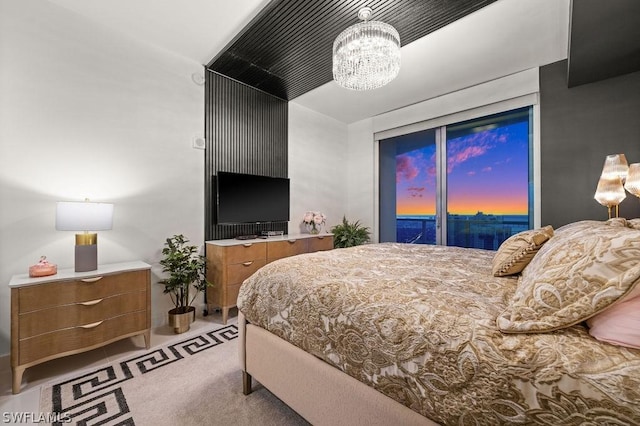 3000 Oasis Grand Blvd Unit Mph3, Fort Myers, FL 33916 - bedroom with access to outside, carpet flooring, and a chandelier