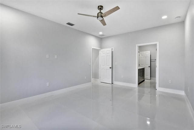 unfurnished bedroom with ceiling fan, recessed lighting, baseboards, and connected bathroom