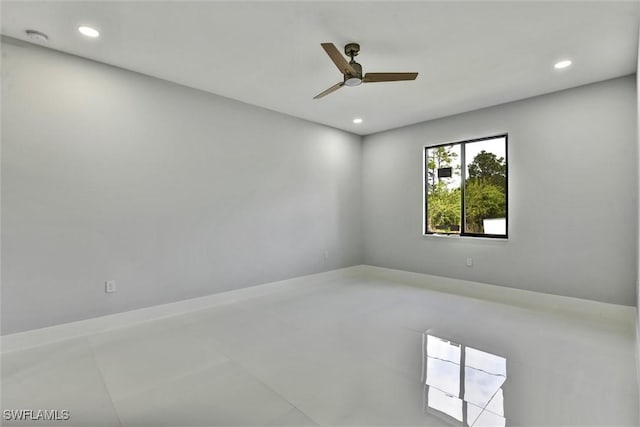 empty room with recessed lighting and ceiling fan