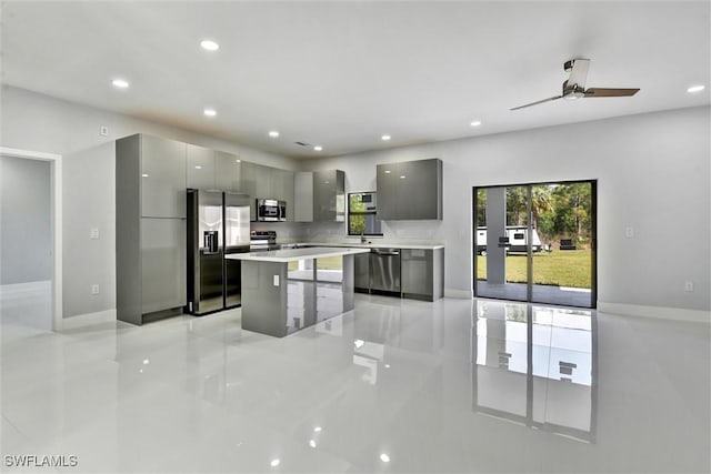 kitchen featuring modern cabinets, gray cabinets, and stainless steel appliances