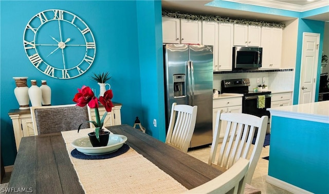 10751 Palazzo Way Unit 303, Fort Myers, FL 33913 - dining room featuring crown molding