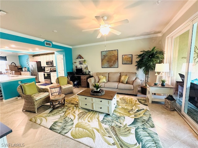 living room with ornamental molding, visible vents, ceiling fan, and light tile patterned floors