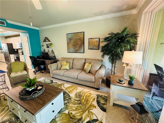 tiled living room featuring ornamental molding and ceiling fan