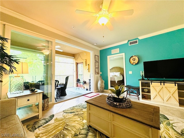 tiled living room with ornamental molding and ceiling fan