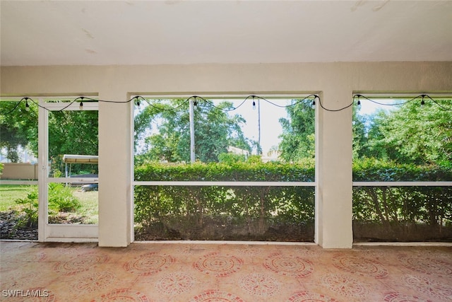 view of unfurnished sunroom