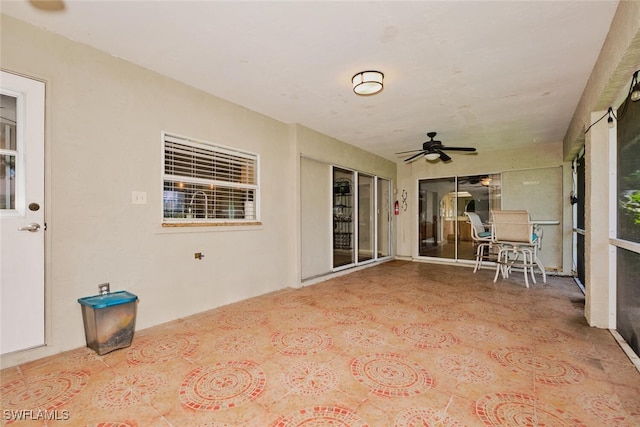 view of patio / terrace featuring ceiling fan