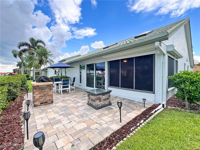 exterior space featuring exterior kitchen