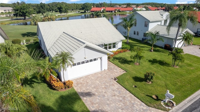 drone / aerial view featuring a water view